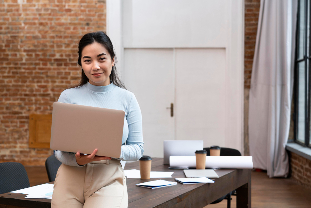 Professional modern resume template on a laptop screen with a cup of Malaysian coffee, representing affordable career growth in Malaysia at RM 7.90.